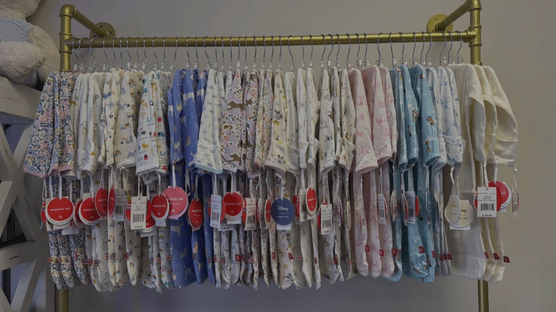 Real baby clothing on display in the From Bumps 2 Babies boutique